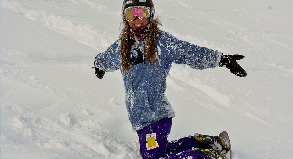 Girl Snowboarding at Marmot Basin